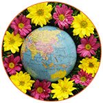 Globe terrestre entouré de fleurs jaunes et roses